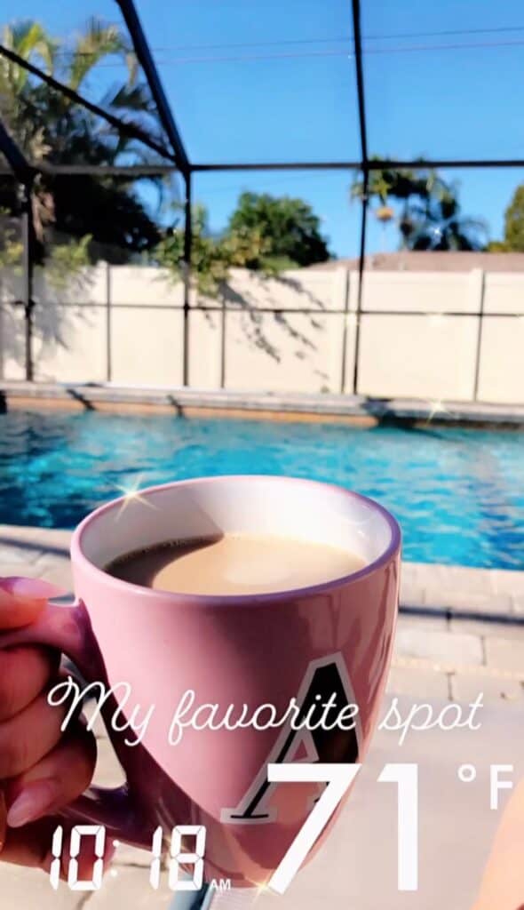 photo of a cup of coffee poolside