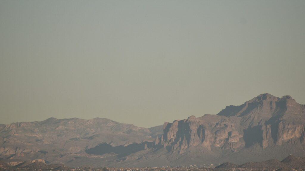 photo of the Superstition Mountains in the distance; with dirty air
